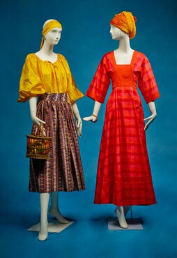 Ensemble by Puck & Hans, c. 1977/78: blouse  in Thai silk and a ‘Djawa skirt’ made of Indian cloth (djawa); dress by Jim Thompson, Thai silk, c. 1975, Kunstmuseum Den Haag. Photo: Alice de Groot.
