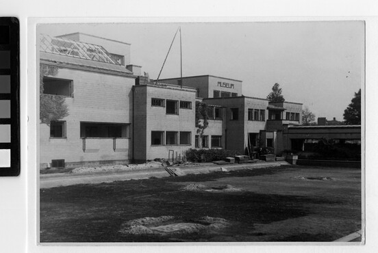 A V2 rocket that exploded across the street caused significant damage to the building.