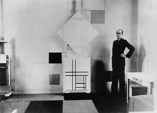 Charles Karsten, Piet Mondrian in his studio with (top) Lozenge Composition with Four Yellow Lines, 1933 (B241) and (bottom) Composition with Double Lines and Yellow, 1934 (B242), Paris, October 1933. Collection RKD – Netherlands Institute for Art History