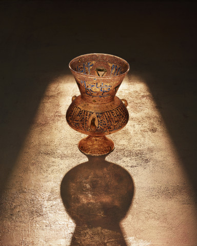 Mosque lamp with Verse of Light from Koran and titles of person commissioning lamp, Syria or Egypt, 1322-1328, glass with enamel painting and gilding, height 32.1 cm, Gemeentemuseum Den Haag.  Photo: Mounir Raji - Visionary Agency